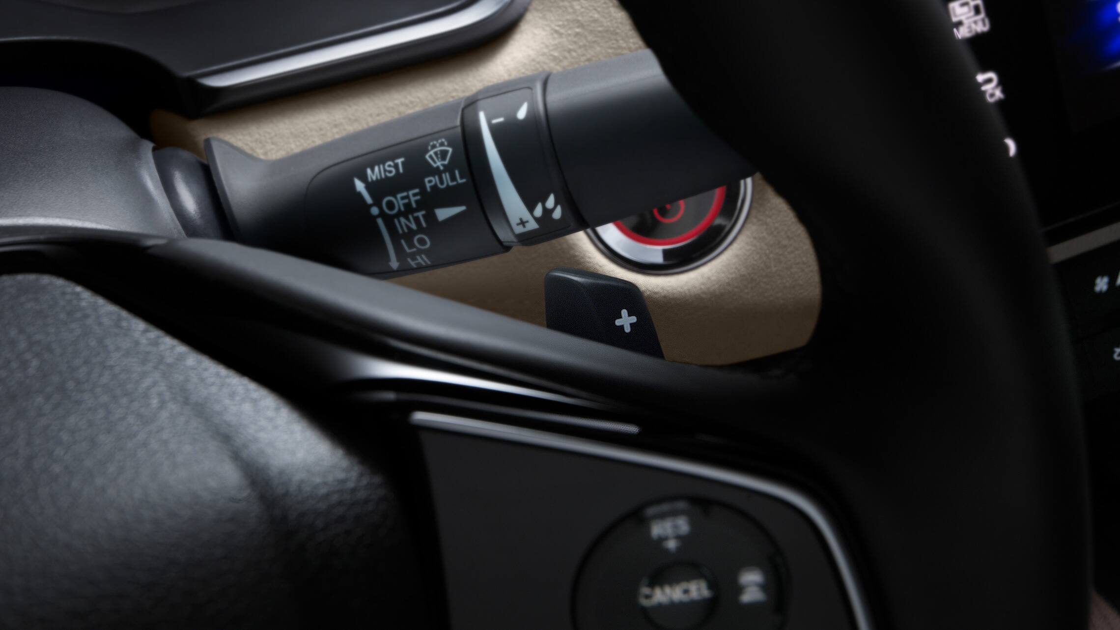 Detail of steering wheel-mounted deceleration selectors in 2021 Clarity Plug-In Hybrid.